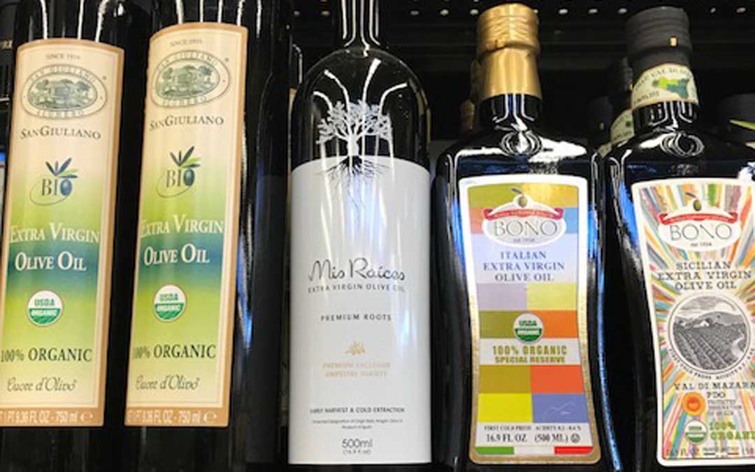 botella de aceite mis raices en america