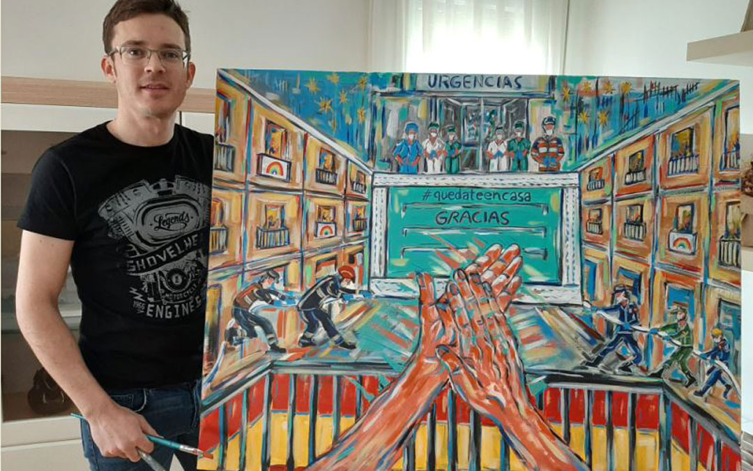 El artista Ignacio Pérez con el cuadro que ha pintado