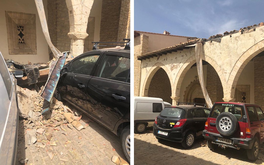 Hundimiento del alero de la iglesia de San Miguel en Cantavieja sobre cuatro vehículos./ La COMARCA